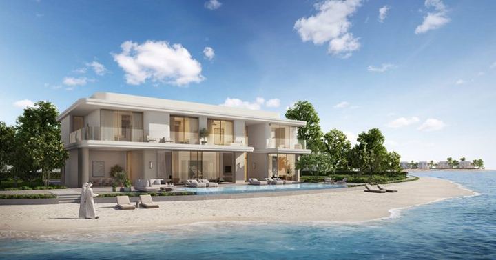A Sky II villa, its pool running out to the sand