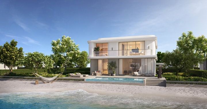 A Vintage III villa and its pool on the beach
